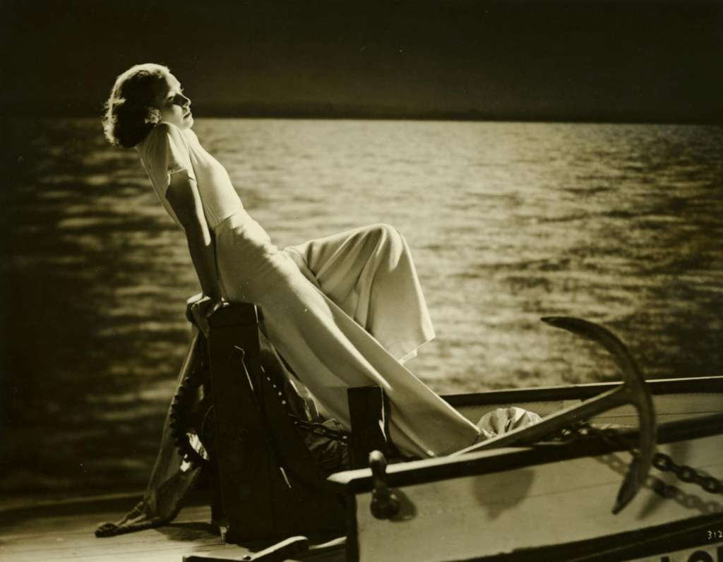 Publicity still of Shirley Ann Richards as Lorna Quidley half reclining on deck of a pearling lugger
